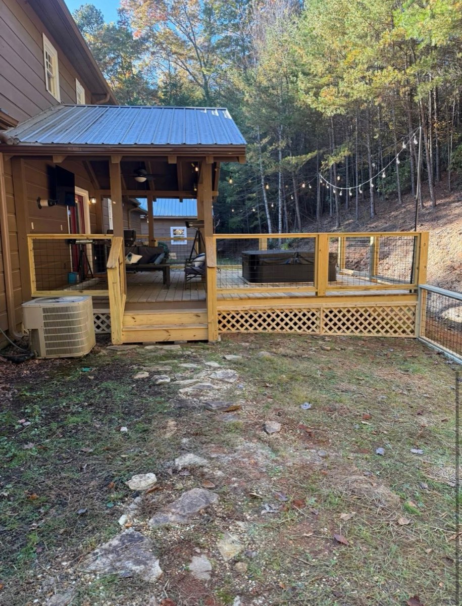Covered deck with new wire-panel railings and lattice skirting